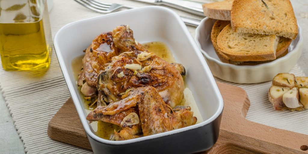 Roasted chicken parts with bio garlic, herb-garlic toast