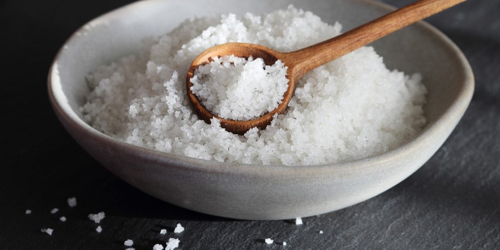 Traditional french natural sea salt of high quality close up.