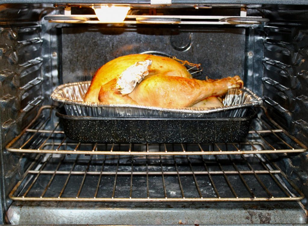 Turkey roasting in oven